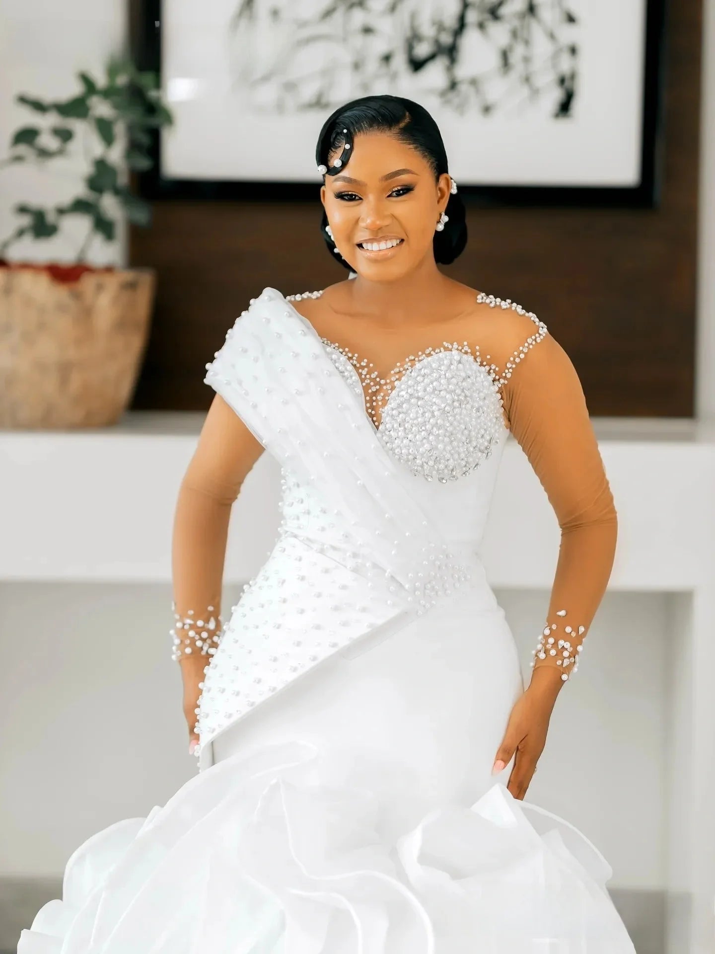 Robe de mariée  princesse, avec corset, décolleté cœur, volants en organza, traîne cathédrale